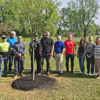 Group standing after tree planting